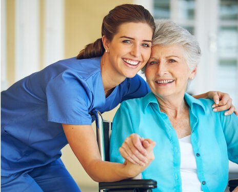 portrait-caregiver-happy-elderly-woman-ith-disability